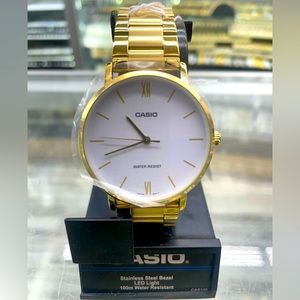 Casio gold analog water, resistant